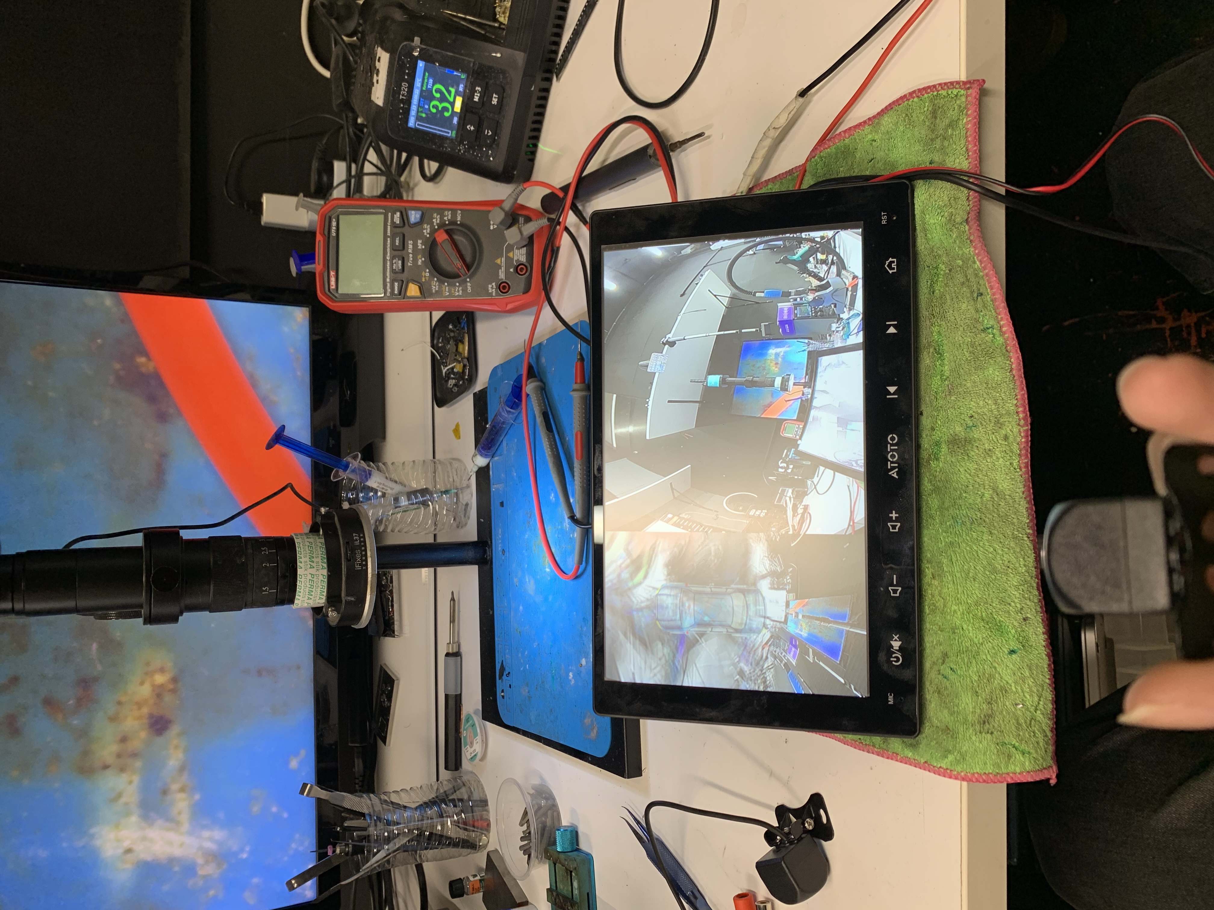 Checking Apple CarPlay and reversing camera function before headunit installation in Brisbane